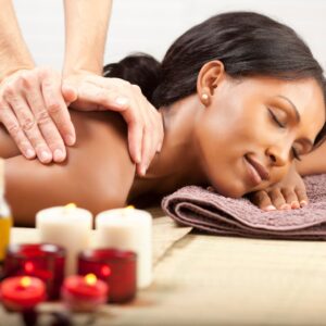 Woman looking peaceful while getting a massage.