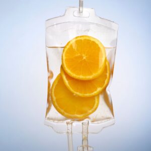 IV bag filled with oranges. 