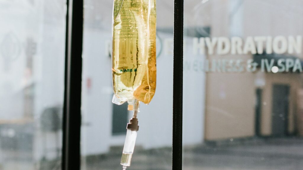 Fluid in an IV bag, hanging.