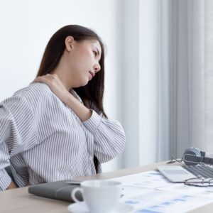 A woman struggling with back pain